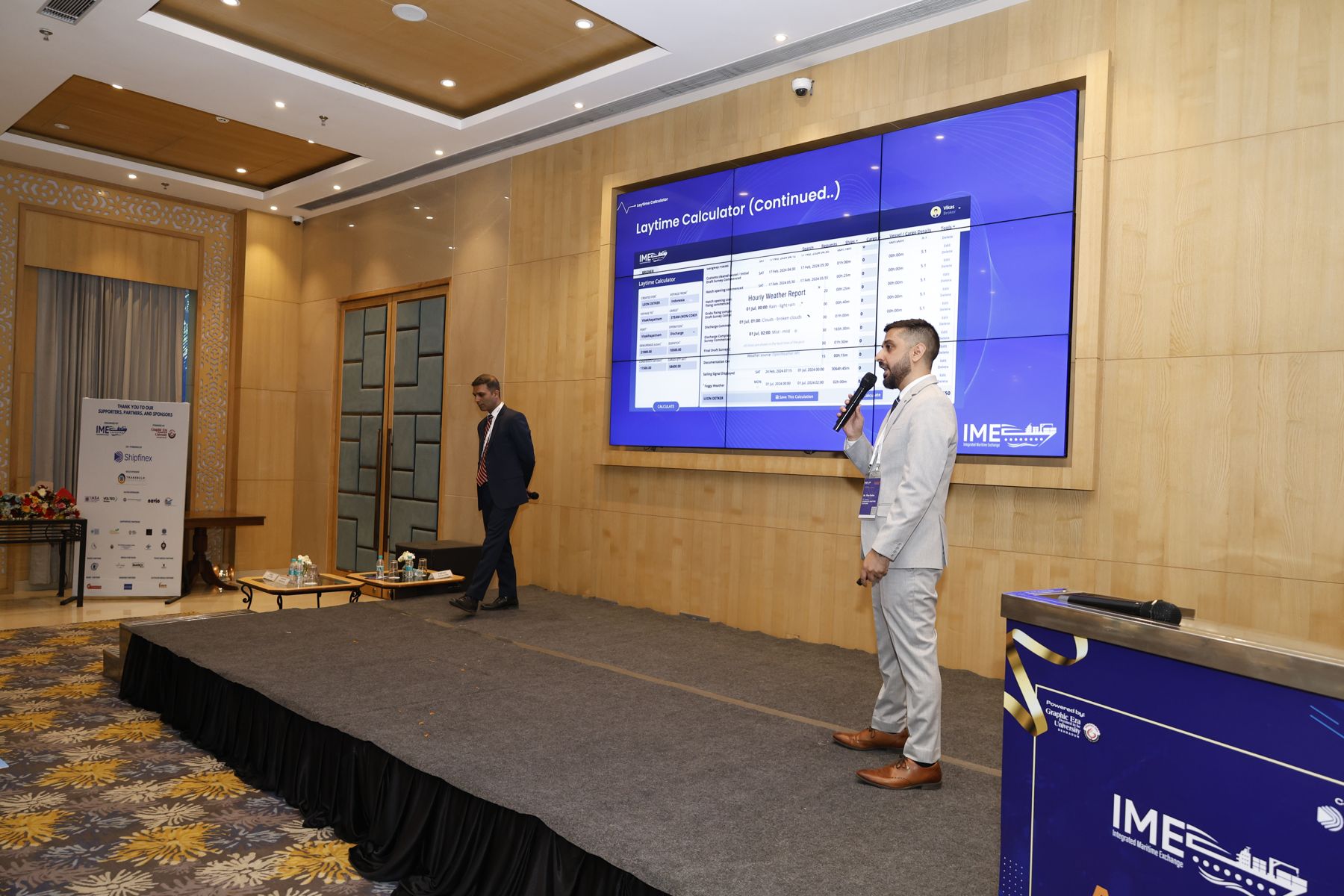 IME team member presenting the Laytime Calculator on stage