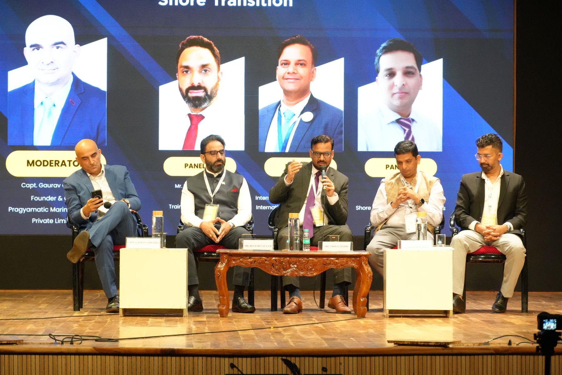 Moderator and panellists during the seafarer wellbeing and shore transition panel